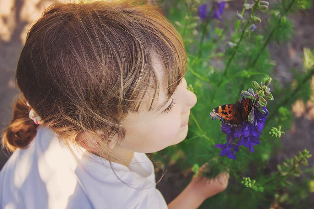 child with butterfly